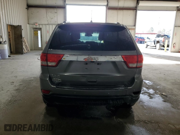 2013 Jeep Grand Cherokee Laredo with VIN 1C4RJFAG3DC612250, listed as a Copart auction lot 53155455 with 157,895 mi miles and Salvage Title. Bid and sale history available at carsss.com. Image 6.