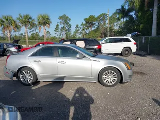 2010 Cadillac CTS Luxury with VIN 1G6DE5EG9A0144317, listed as a IAAI auction lot 42093890 with 70,099 mi miles. Bid and sale history available at carsss.com. Image 13.