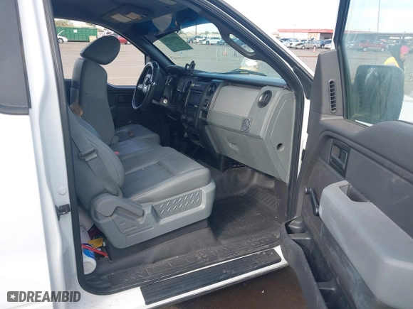 2014 Ford F-150 XL with VIN 1FTMF1CM3EKG36797, listed as a IAAI auction lot 40892574 with 136,417 mi miles. Bid and sale history available at carsss.com. Image 5.