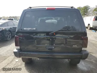 1999 Jeep Cherokee Sport with VIN 1J4FF68S1XL671309, listed as a Copart auction lot 48005485 with 177,658 mi miles and Salvage Title. Bid and sale history available at carsss.com. Image 6.