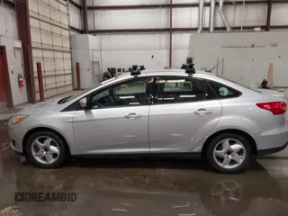 2015 Ford Focus SE with VIN 1FADP3F28FL231684, listed as a IAAI auction lot 41914284 with 100,195 mi miles. Bid and sale history available at carsss.com. Image 14.