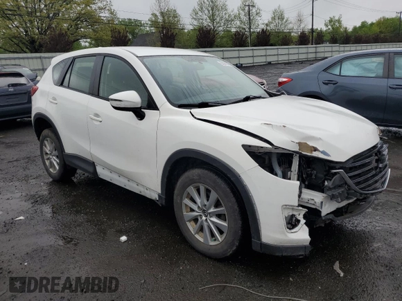 2016 Mazda CX-5 Sport z VIN JM3KE4BY2G0802376, wystawiony jako Copart lot #55976585 z przebiegiem 112 600 mil mil oraz Szkoda całkowita • Salvage title. Historia ofert i sprzedaży dostępna na DreamBid. Obrazek 4.