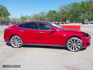2014 Tesla Model S 60 kWh Battery with VIN 5YJSA1H1XEFP38289, listed as a IAAI auction lot 42092052 with 75,668 mi miles. Bid and sale history available at carsss.com. Image 14.