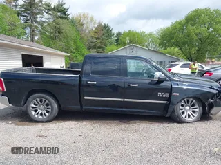 2014 Ram 1500 Longhorn Limited z VIN 1C6RR7WT4ES402324, wystawiony jako IAAI lot #42167372 z przebiegiem 92 188 mil mil oraz . Historia ofert i sprzedaży dostępna na DreamBid. Obrazek 14.