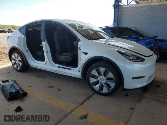 2022 Tesla Model Y Long Range z VIN 7SAYGDEE5NA015841, wystawiony jako Copart lot #57842275 z przebiegiem 51 952 mil mil oraz Szkody całkowita. Historia ofert i sprzedaży dostępna na DreamBid. Obrazek 4.