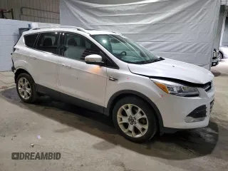 2016 Ford Escape Titanium with VIN 1FMCU9J93GUB78230, listed as a Copart auction lot 51661025 with 98,515 mi miles and Salvage Title. Bid and sale history available at DreamBid. Image 4.