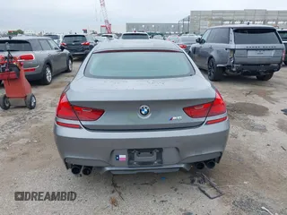 2014 BMW M6 with VIN WBS6C9C54EDV73926, listed as a IAAI auction lot 42421586 with 82,216 mi miles and . Bid and sale history available at DreamBid. Image 17.