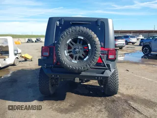 2007 Jeep Wrangler Unlimited X with VIN 1J4GA39147L157588, listed as a IAAI auction lot 41637089 with 87,812 mi miles and . Bid and sale history available at DreamBid. Image 16.