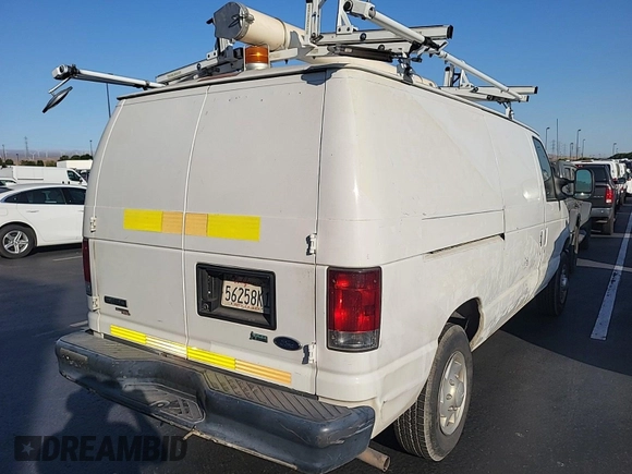 2013 Ford Econoline Cargo Commercial z VIN 1FTNE1EW1DDA61995, wystawiony jako IAAI lot #42516622 z przebiegiem 182 503 mil mil oraz . Historia ofert i sprzedaży dostępna na DreamBid. Obrazek 34.
