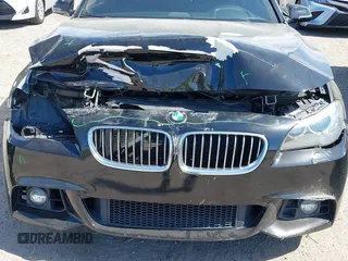 2014 BMW 5 Series 535d with VIN WBAXA5C58ED690447, listed as a IAAI auction lot 41577468 with 149,080 mi miles and . Bid and sale history available at carsss.com. Image 6.
