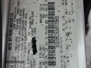 2010 Ford Fusion Hybrid z VIN 3FADP0L30AR122805, wystawiony jako Copart lot #52276255 z przebiegiem 146 073 mil mil oraz Szkoda całkowita • Salvage title. Historia ofert i sprzedaży dostępna na DreamBid. Obrazek 14.