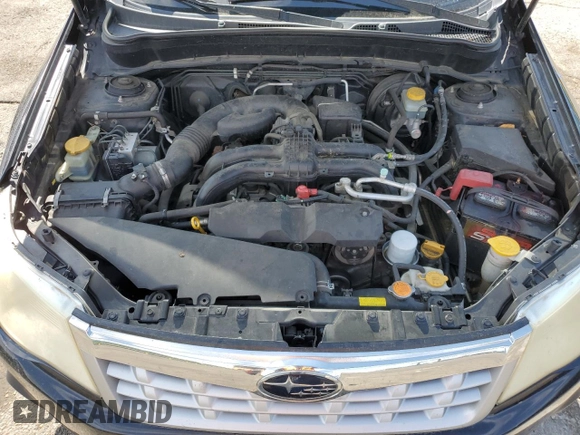 2012 Subaru Forester X Premium with VIN JF2SHBDC6CH415672, listed as a Copart auction lot 61815565 with 117,692 mi miles and Salvage title. Bid and sale history available at DreamBid. Image 11.