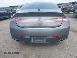 2014 Lincoln MKZ z VIN 3LN6L2GK3ER807586, wystawiony jako IAAI lot #42426125 z przebiegiem 198 281 mil mil oraz . Historia ofert i sprzedaży dostępna na DreamBid. Obrazek 15.