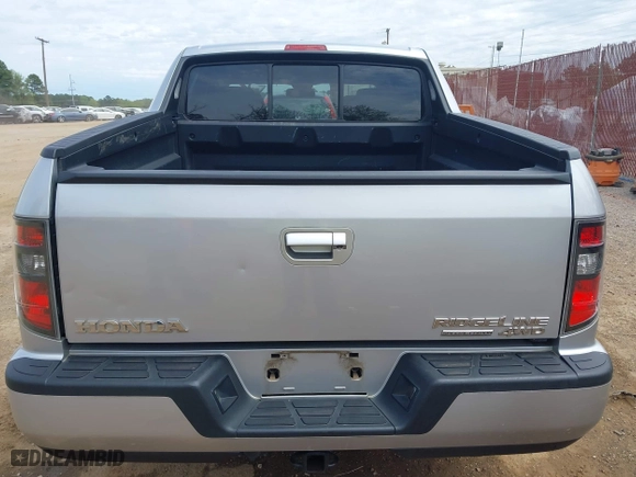 2014 Honda Ridgeline SE with VIN 5FPYK1F62EB013329, listed as a IAAI auction lot 41876728 with 127,014 mi miles. Bid and sale history available at carsss.com. Image 16.