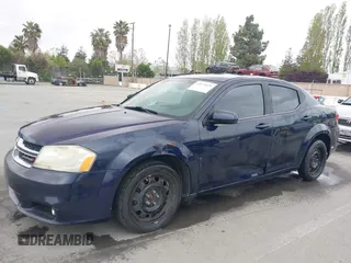 2013 Dodge Avenger SXT with VIN 1C3CDZCB0DN662712, listed as a IAAI auction lot 42070421 with 160,434 mi miles and . Bid and sale history available at carsss.com. Image 2.