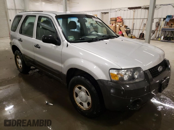 2007 Ford Escape XLS with VIN 1FMCU92Z77KA84801, listed as a Copart auction lot 82052144 with 180,774 mi miles and Salvage title. Bid and sale history available at DreamBid. Image 4.