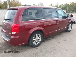 2019 Dodge Grand Caravan SXT with VIN 2C4RDGCGXKR585563, listed as a IAAI auction lot 40949350 with 122,577 mi miles and . Bid and sale history available at DreamBid. Image 4.