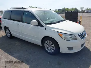 2012 Volkswagen Routan SE z VIN 2C4RVABG0CR193964, wystawiony jako IAAI lot #42122834 z przebiegiem 185 389 mil mil oraz . Historia ofert i sprzedaży dostępna na DreamBid. Obrazek 1.
