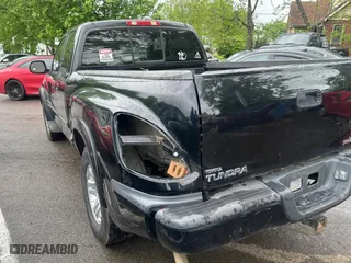 2004 Toyota Tundra Ltd with VIN 5TBBT48194S446860, listed as a Copart auction lot 54931145 with 403,410 mi miles and Salvage Title. Bid and sale history available at carsss.com. Image 3.