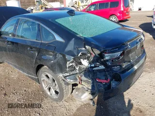 2018 Honda Accord EX with VIN 1HGCV1F44JA052436, listed as a IAAI auction lot 41848390 with 99,871 mi miles and . Bid and sale history available at DreamBid. Image 6.