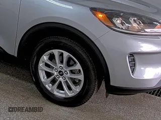 2022 Ford Escape SE with VIN 1FMCU9G65NUB32764, listed as a IAAI auction lot 42806882 with 81,565 mi miles and . Bid and sale history available at DreamBid. Image 5.
