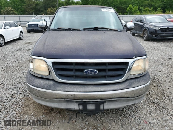 1999 Ford F-150 with VIN 2FTZX1729XCA64069, listed as a Copart auction lot 56246845 with Not provided miles and Salvage title. Bid and sale history available at DreamBid. Image 5.