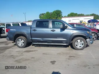 2010 Toyota Tundra with VIN 5TFEY5F11AX097360, listed as a IAAI auction lot 41990256 with 350,830 mi miles and . Bid and sale history available at DreamBid. Image 13.