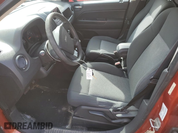 2010 Jeep Compass North Edition with VIN 1J4NF4FB0AD630982, listed as a Copart auction lot 50602465 with 233,513 mi miles and Clean Title. Bid and sale history available at carsss.com. Image 7.