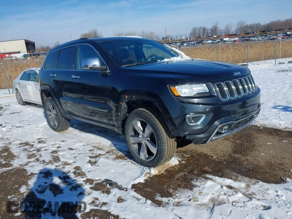 2015 Jeep Grand Cherokee Overland z VIN 1C4RJFCG3FC726748, wystawiony jako IAAI lot #41369715 z przebiegiem 120 905 mil mil oraz . Historia ofert i sprzedaży dostępna na DreamBid. Obrazek 1.