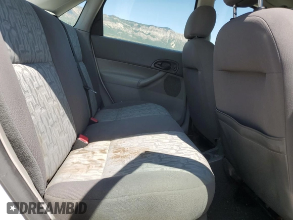 2005 Ford Focus S with VIN 1FAFP34N05W296550, listed as a Copart auction lot 59391835 with 216,509 mi miles and Salvage title. Bid and sale history available at DreamBid. Image 10.