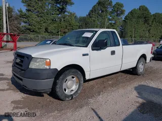 2007 Ford F-150 XL with VIN 1FTRF12W97NA59512, listed as a IAAI auction lot 40213834 with 176,358 mi miles. Bid and sale history available at carsss.com. Image 2.