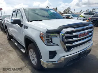 2022 GMC Sierra 1500 SLE with VIN 1GTR8BEK5NZ135368, listed as a IAAI auction lot 41544688 with 113,322 mi miles. Bid and sale history available at carsss.com. Image 1.