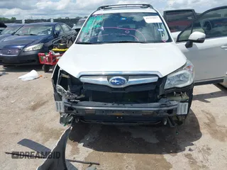 2015 Subaru Forester Touring with VIN JF2SJAWC0FH806493, listed as a IAAI auction lot 42355867 with 128,937 mi miles and . Bid and sale history available at DreamBid. Image 6.