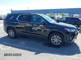 2021 Chevrolet Traverse LT Cloth with VIN 1GNERGKW9MJ162089, listed as a IAAI auction lot 41944248 with 99,586 mi miles. Bid and sale history available at carsss.com. Image 12.