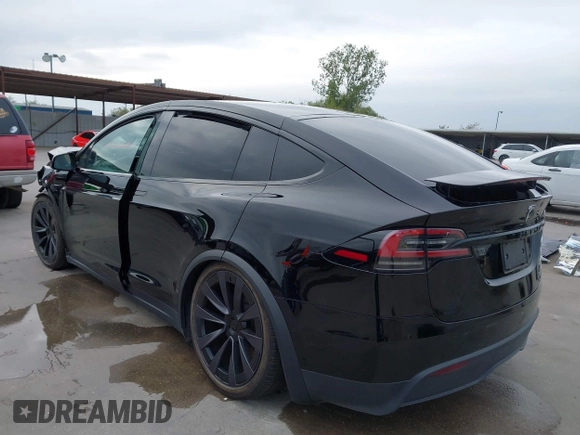 2023 Tesla Model X Plaid with VIN 7SAXCBE63PF376320, listed as a IAAI auction lot 40954738 with Not Provided miles and . Bid and sale history available at DreamBid. Image 3.