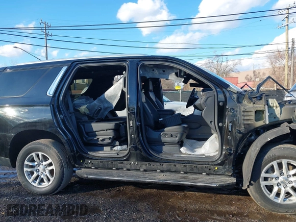 2022 Chevrolet Tahoe LT with VIN 1GNSKNKDXNR312014, listed as a IAAI auction lot 41666093 with Not provided miles and . Bid and sale history available at DreamBid. Image 12.
