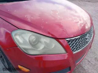 2012 Suzuki Kizashi SE with VIN JS2RE9A31C6101027, listed as a IAAI auction lot 41213426 with 174,490 mi miles. Bid and sale history available at carsss.com. Image 6.
