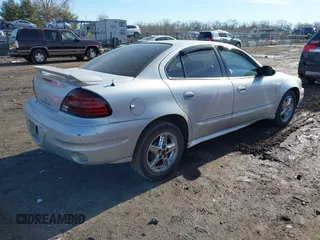 2004 Pontiac Grand Am SE1 with VIN 1G2NF52E54M646874, listed as a IAAI auction lot 41564072 with 97,437 mi miles. Bid and sale history available at carsss.com. Image 4.