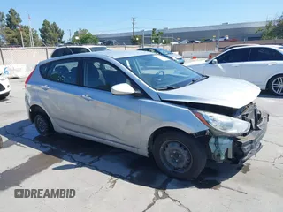 2014 Hyundai Accent GS z VIN KMHCT5AE3EU189511, wystawiony jako IAAI lot #42321191 z przebiegiem 140 436 mil mil oraz . Historia ofert i sprzedaży dostępna na DreamBid. Obrazek 1.