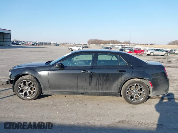 2015 Chrysler 300 with VIN 2C3CCAGG8FH808618, listed as a IAAI auction lot 41695711 with 137,050 mi miles. Bid and sale history available at carsss.com. Image 15.