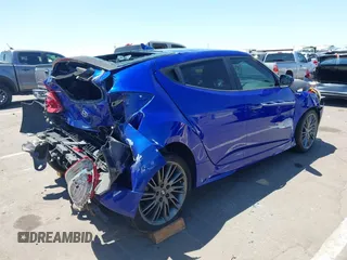 2013 Hyundai Veloster w/Gray Int z VIN KMHTC6AD3DU134956, wystawiony jako IAAI lot #42560944 z przebiegiem 108 166 mil mil oraz . Historia ofert i sprzedaży dostępna na DreamBid. Obrazek 4.