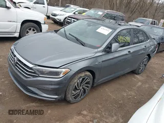 2021 Volkswagen Jetta SEL z VIN 3VWE57BU5MM086681, wystawiony jako IAAI lot #41832830 z przebiegiem 37 398 mil mil oraz . Historia ofert i sprzedaży dostępna na DreamBid. Obrazek 17.