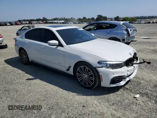 2020 BMW 5 Series 530e with VIN WBAJA9C03LCD28842, listed as a Copart auction lot 69901984 with 63,036 mi miles and Salvage Title. Bid and sale history available at DreamBid. Image 4.