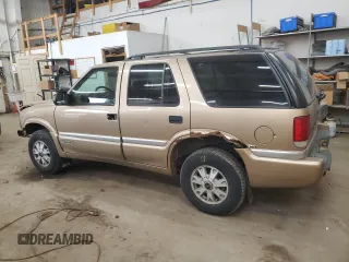2000 GMC Jimmy SLT Convenience with VIN 1GKDT13WXY2109634, listed as a Copart auction lot 49811075 with 190,465 mi miles and Salvage Title. Bid and sale history available at carsss.com. Image 2.