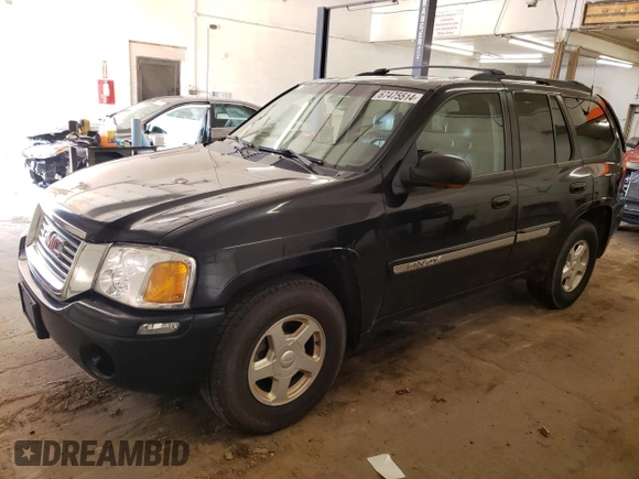 2003 GMC Envoy SLT with VIN 1GKDT13S732208692, listed as a Copart auction lot 67475514 with 243,146 mi miles and Salvage Title. Bid and sale history available at carsss.com. Image 1.
