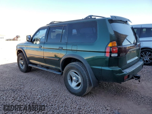 2000 Mitsubishi Montero LS z VIN JA4MT31H0YP015030, wystawiony jako Copart lot #83232584 z przebiegiem 75 294 mil mil oraz Szkoda całkowita • Salvage title. Historia ofert i sprzedaży dostępna na DreamBid. Obrazek 2.