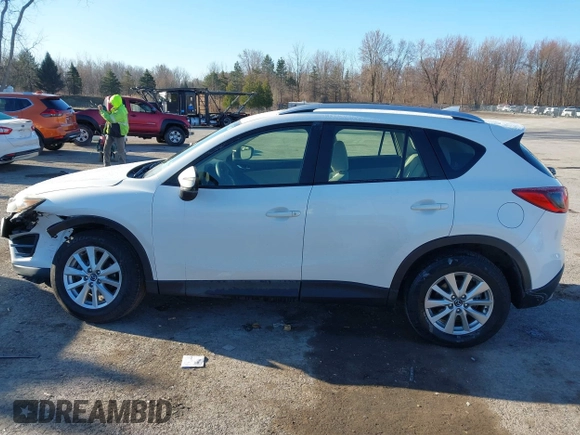 2016 Mazda CX-5 Sport with VIN JM3KE4BY8G0605504, listed as a IAAI auction lot 41866173 with 91,797 mi miles. Bid and sale history available at carsss.com. Image 15.