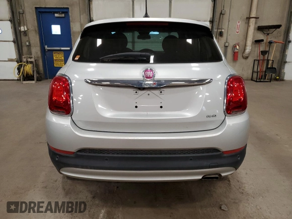 2016 FIAT 500X Lounge z VIN ZFBCFYDT9GP339746, wystawiony jako Copart lot #55248725 z przebiegiem 69 231 mil mil oraz Tytuł czysty. Historia ofert i sprzedaży dostępna na DreamBid. Obrazek 6.