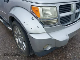 2008 Dodge Nitro SLT with VIN 1D8GT58K58W127412, listed as a IAAI auction lot 41544874 with 232,748 mi miles. Bid and sale history available at carsss.com. Image 12.