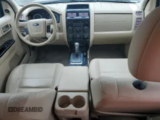 2010 Ford Escape Limited with VIN 1FMCU0EGXAKA03092, listed as a Copart auction lot 61094785 with 114,884 mi miles and Salvage title. Bid and sale history available at DreamBid. Image 8.